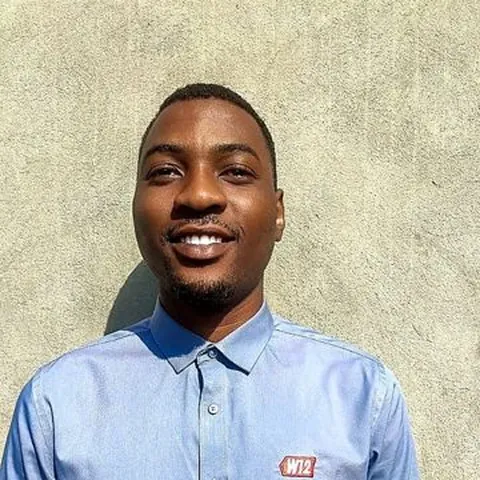 Portrait of Dennis Mchunguzi